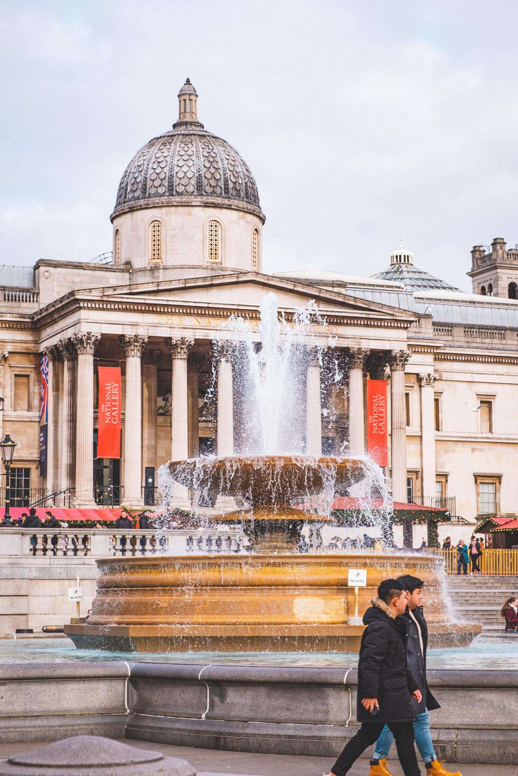 People in front of Trafalgar Square London