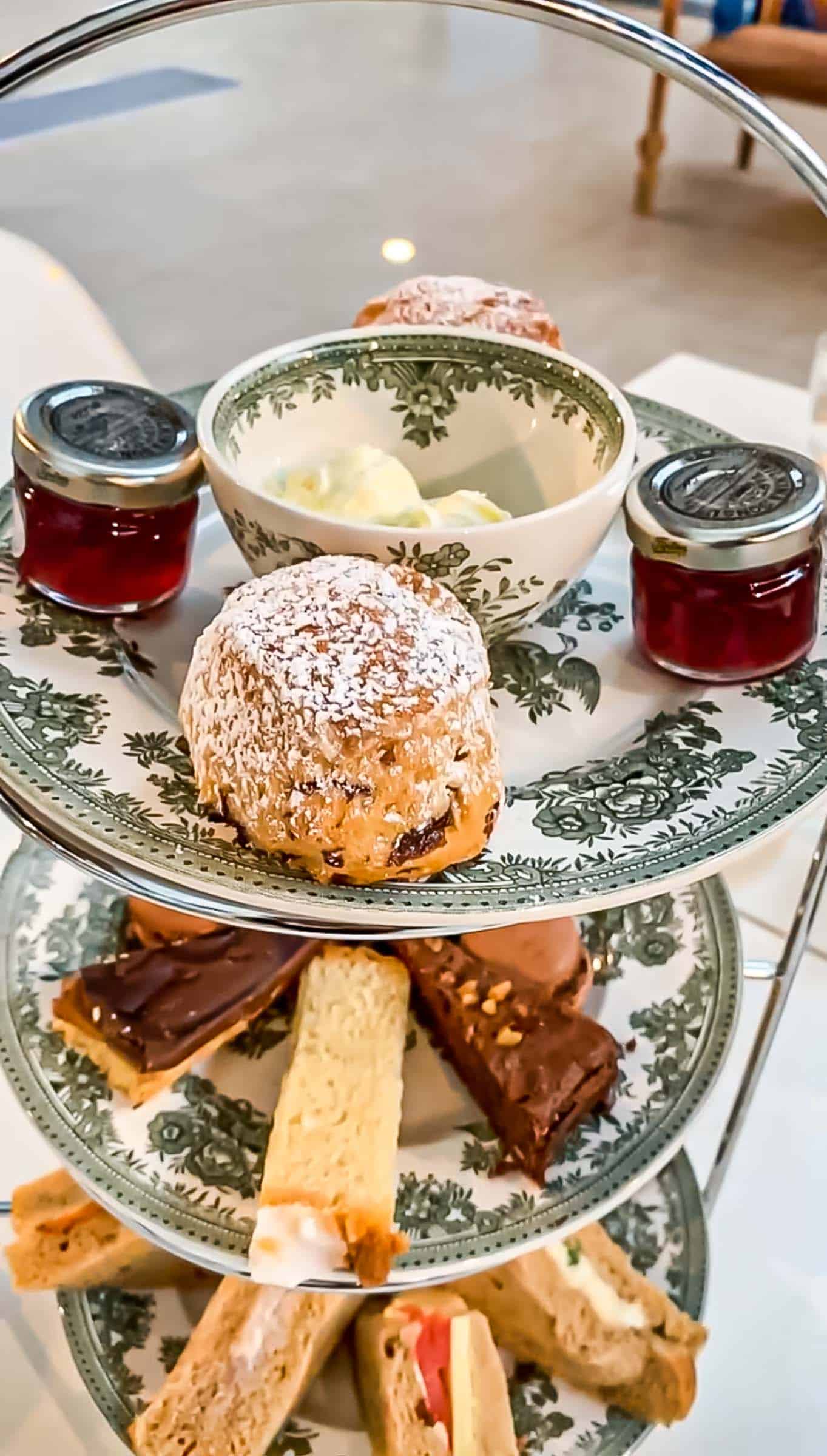 tea, biscuits, and sandwiches in a London tea house