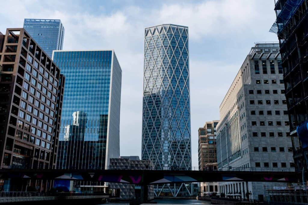 Things to Do in Canary Wharf London skyscrapers standing tall in London's famous neighborhood of Canary Wharf. There are tons of Canary Wharf places to visit, but these skyscrapers are the most iconic part.