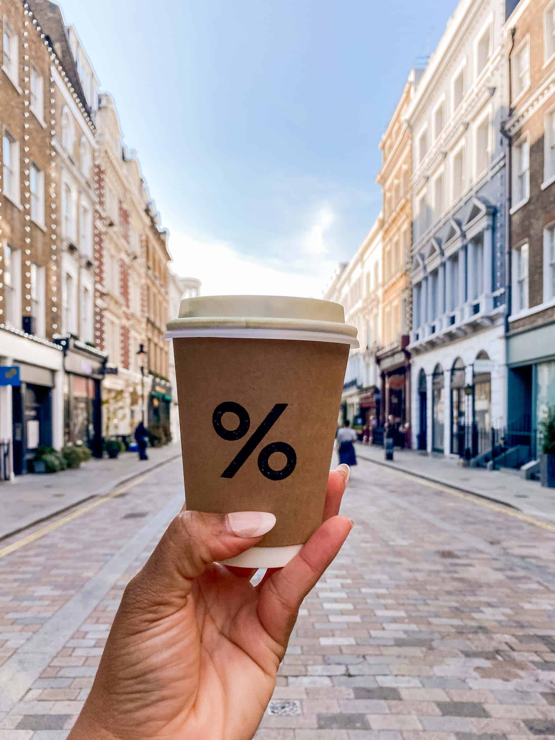 Coffee Shops To Visit While In London coffee cup from percent coffee shop in Covent Garden