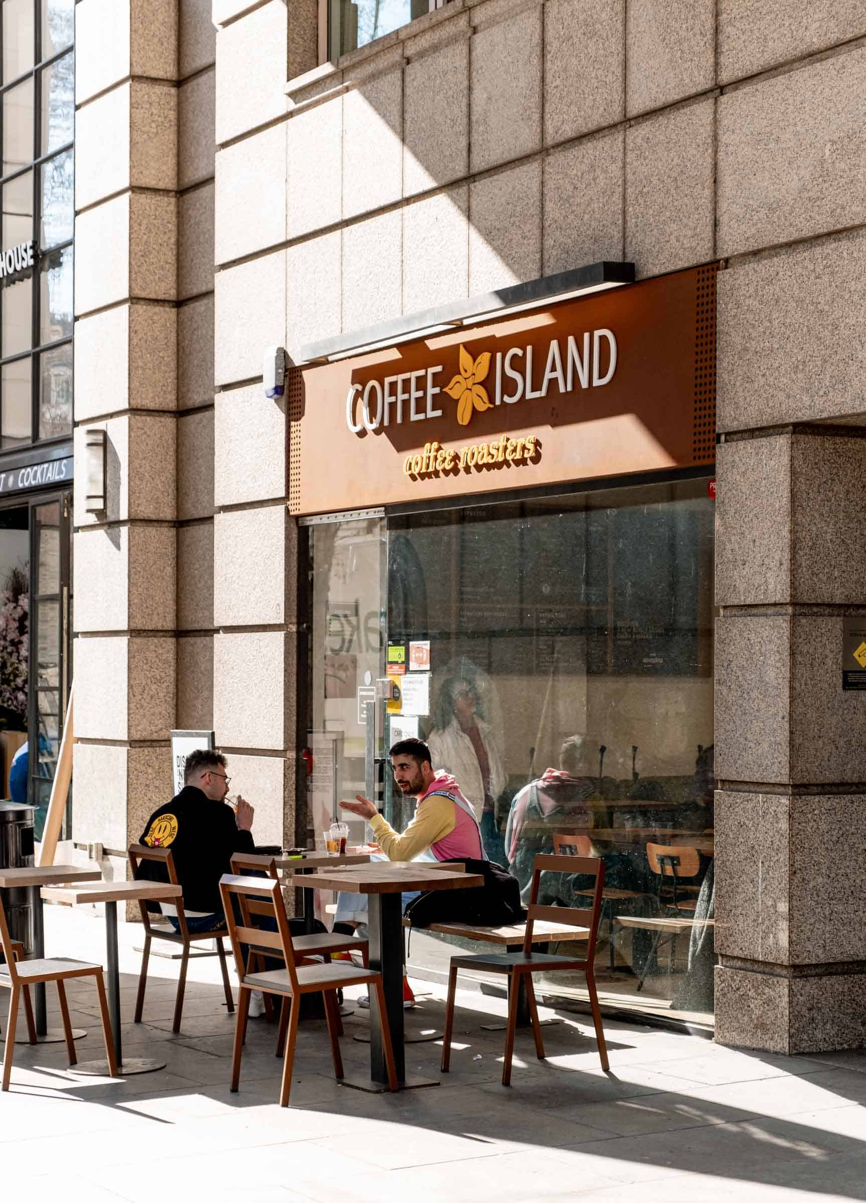 Coffee Island A couple of friends hanging out by Coffee Island coffee roasters in covent Garden