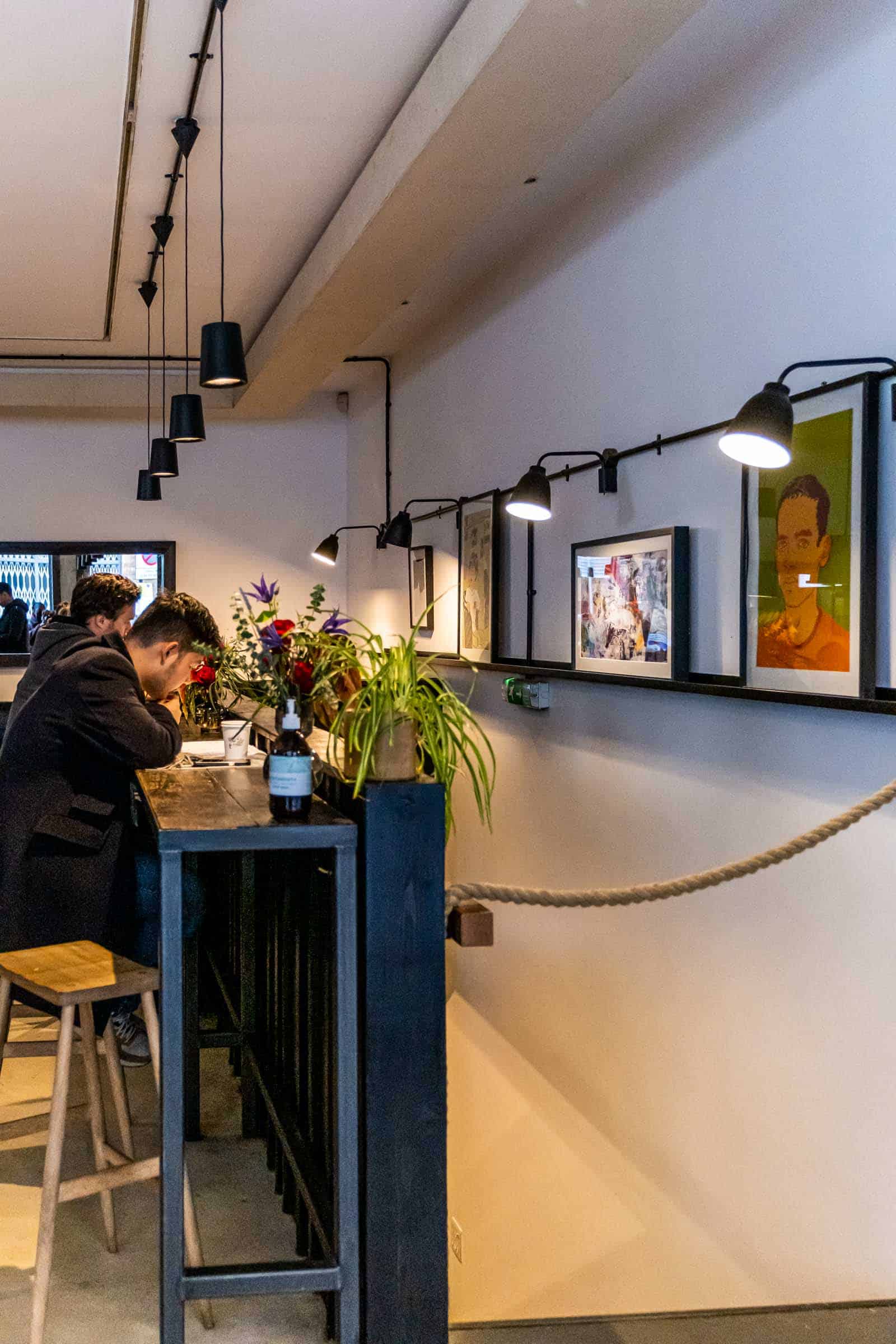 group of guys studying at a quaint coffee shop Shoreditch, East London