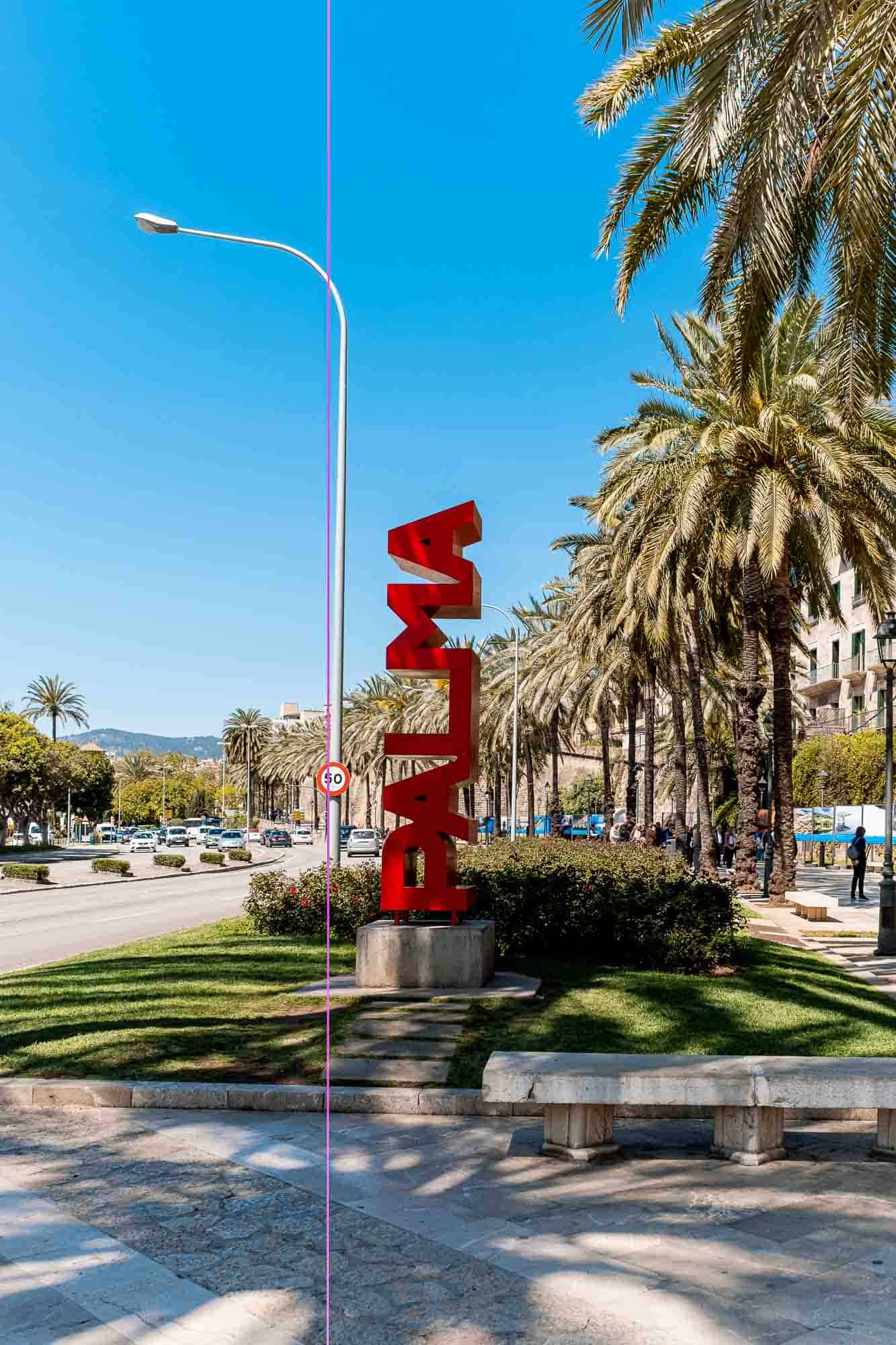 Palma sign along the sidewalk