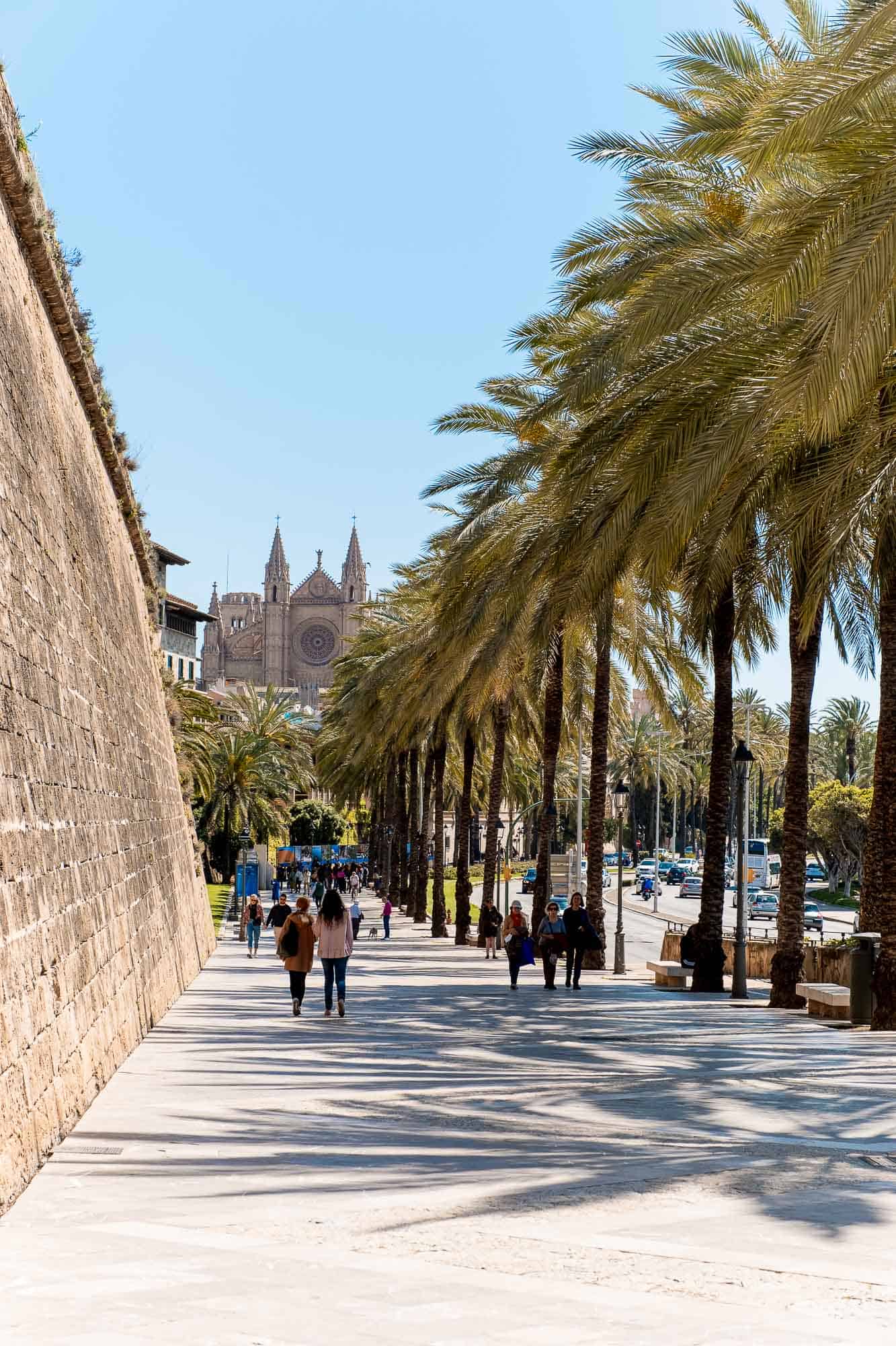 People walking towards Palma Cathedral 