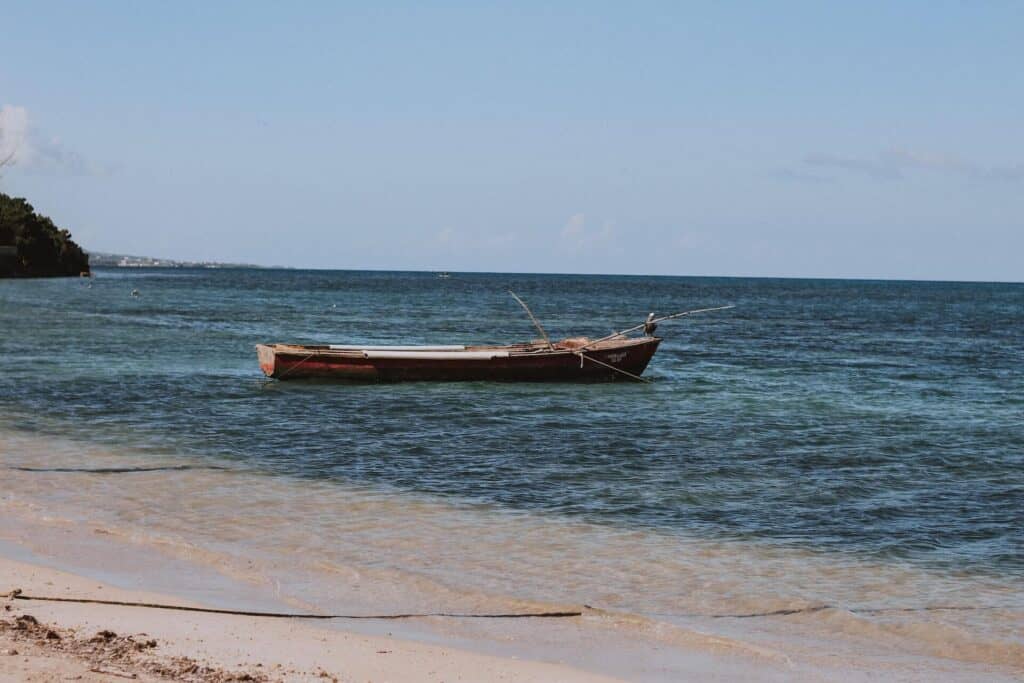 Boat at sea on the shores of Burwood Beach Jamaica