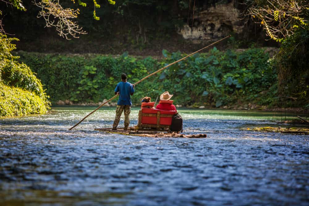 Tourists on Martha Brae River in Jamaica Tourists on Martha Brae River in Jamaica