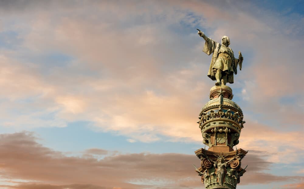 Monument of Christopher Columbus pointing towards America Monument of Christopher Columbus pointing towards America