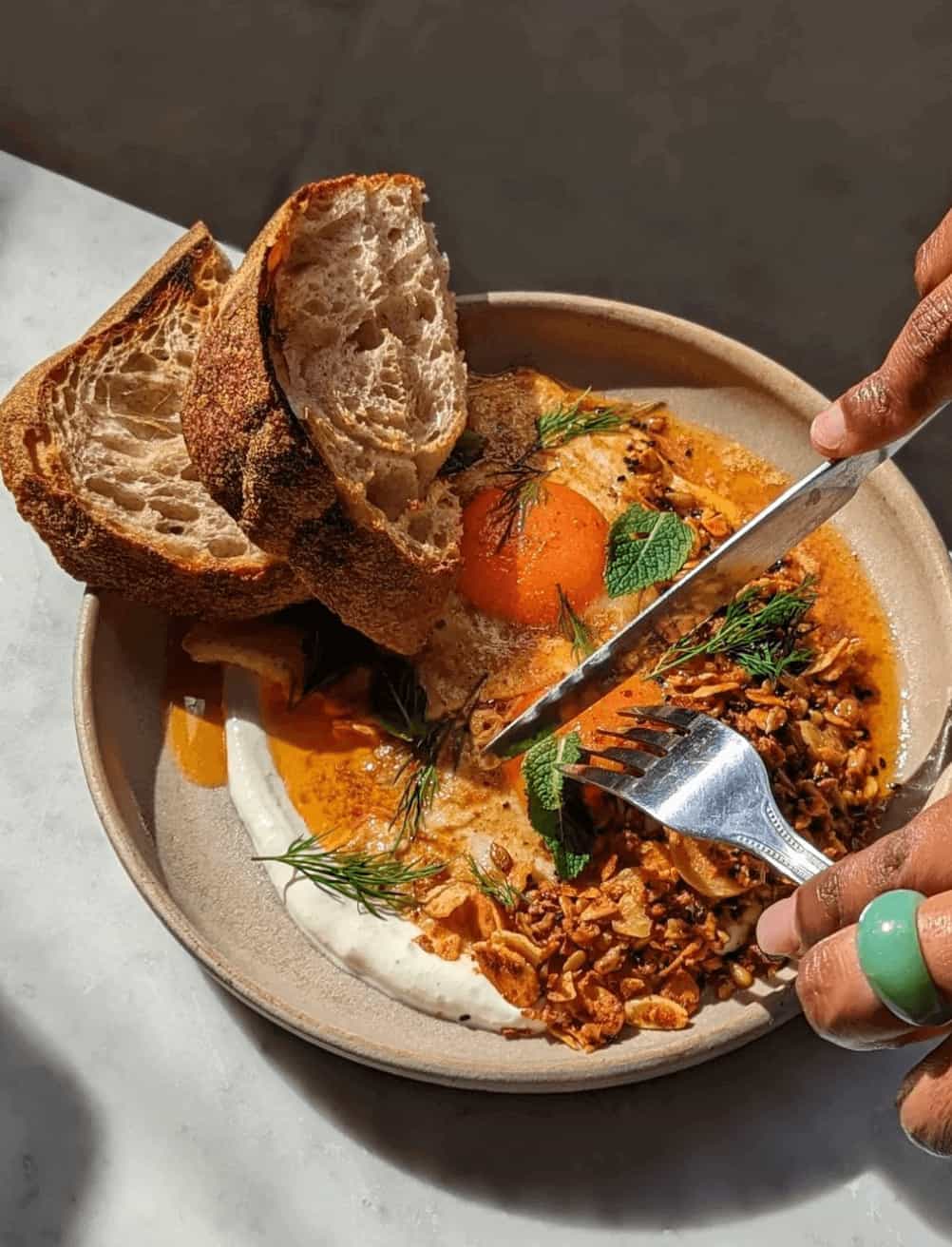 26 Grains Covent Garden a plate of eggs with sourdough bread 