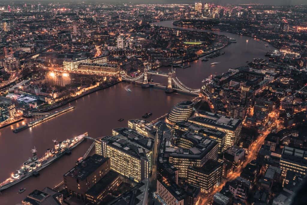 London at night Aerial view of London and the River Thames at night