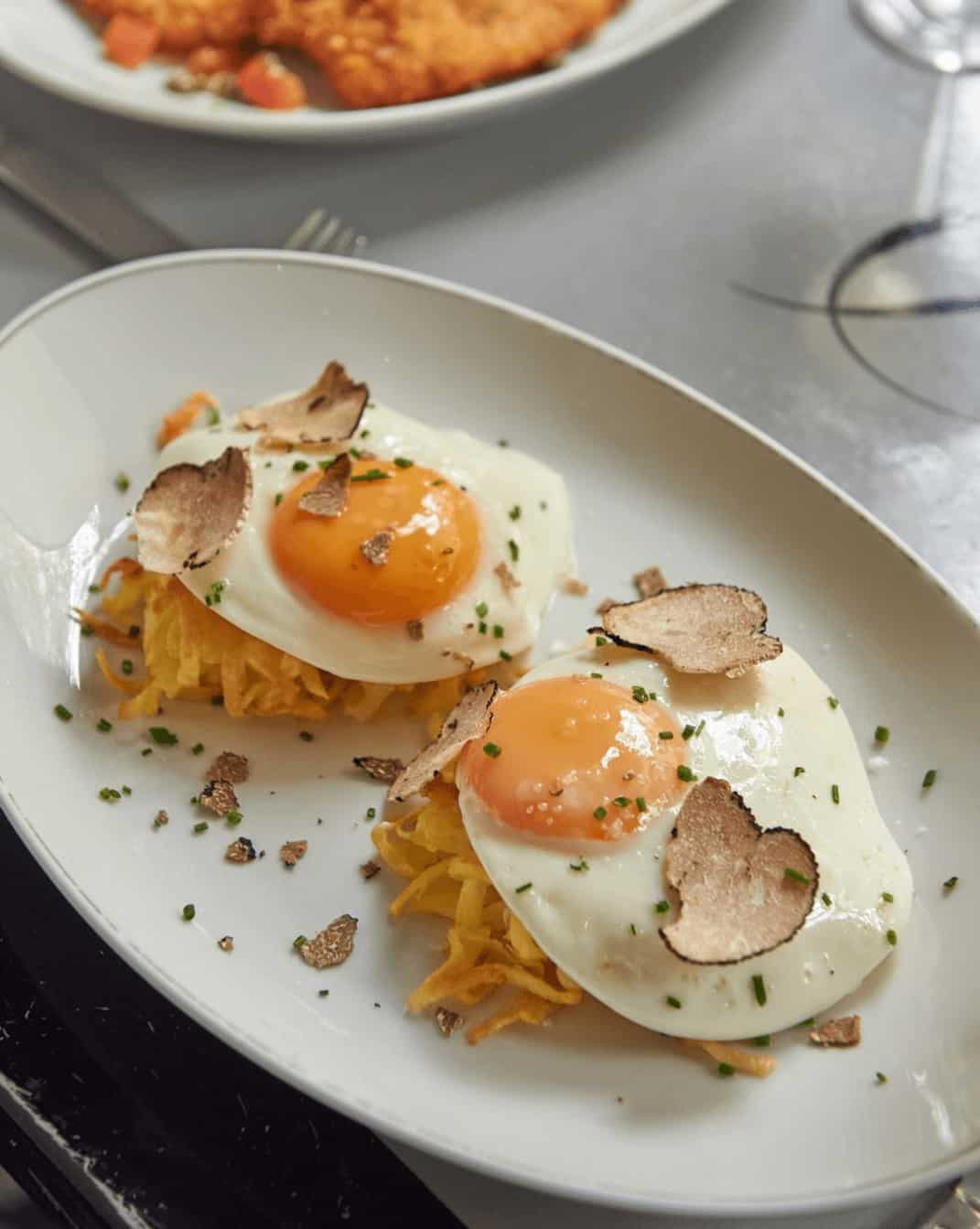 The Delaunay Covent Garden with fried eggs over fries