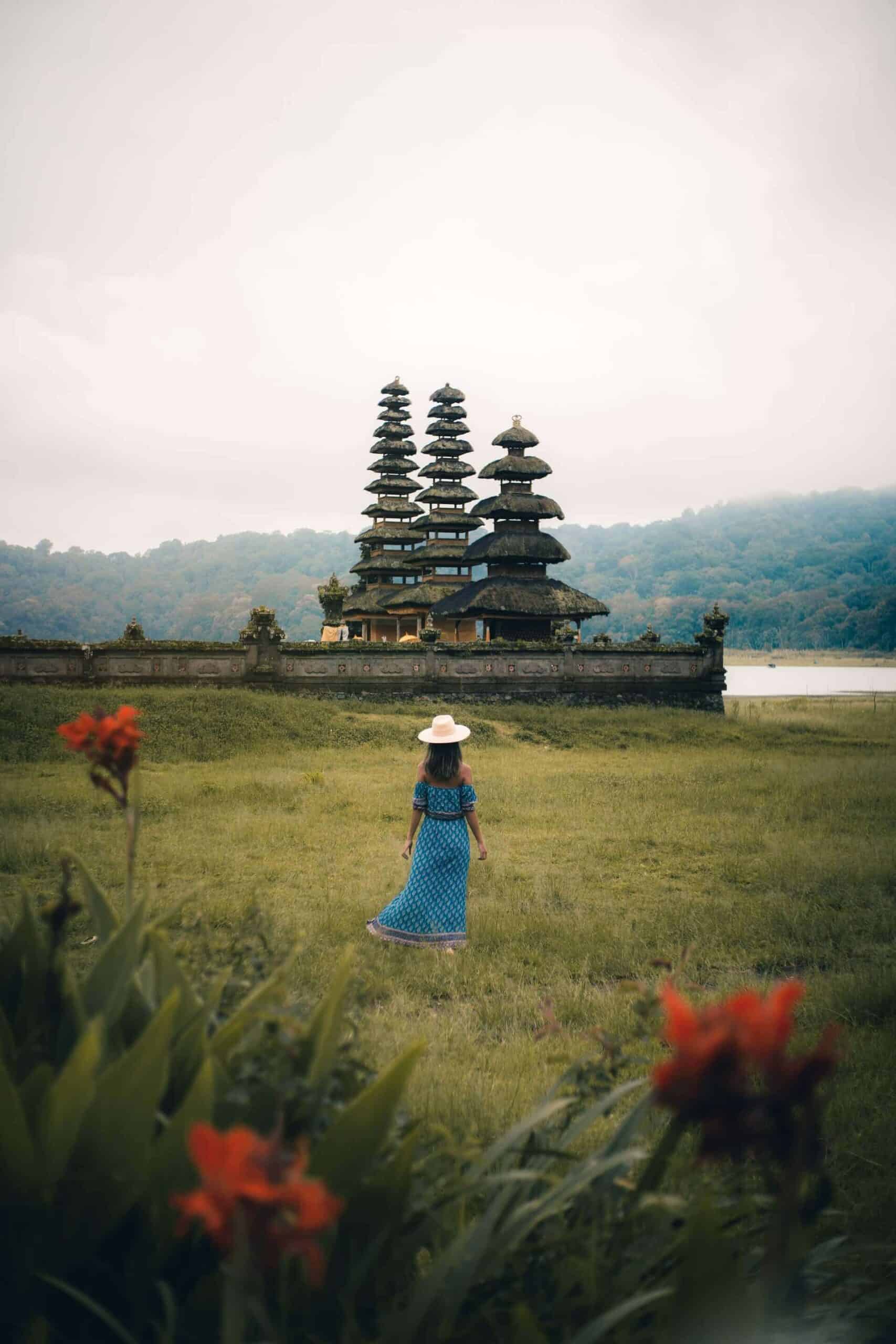 Bali Indonesia scaled woman standing in a field in Bali Indonesia one of the best Black-friendly countries in Asia