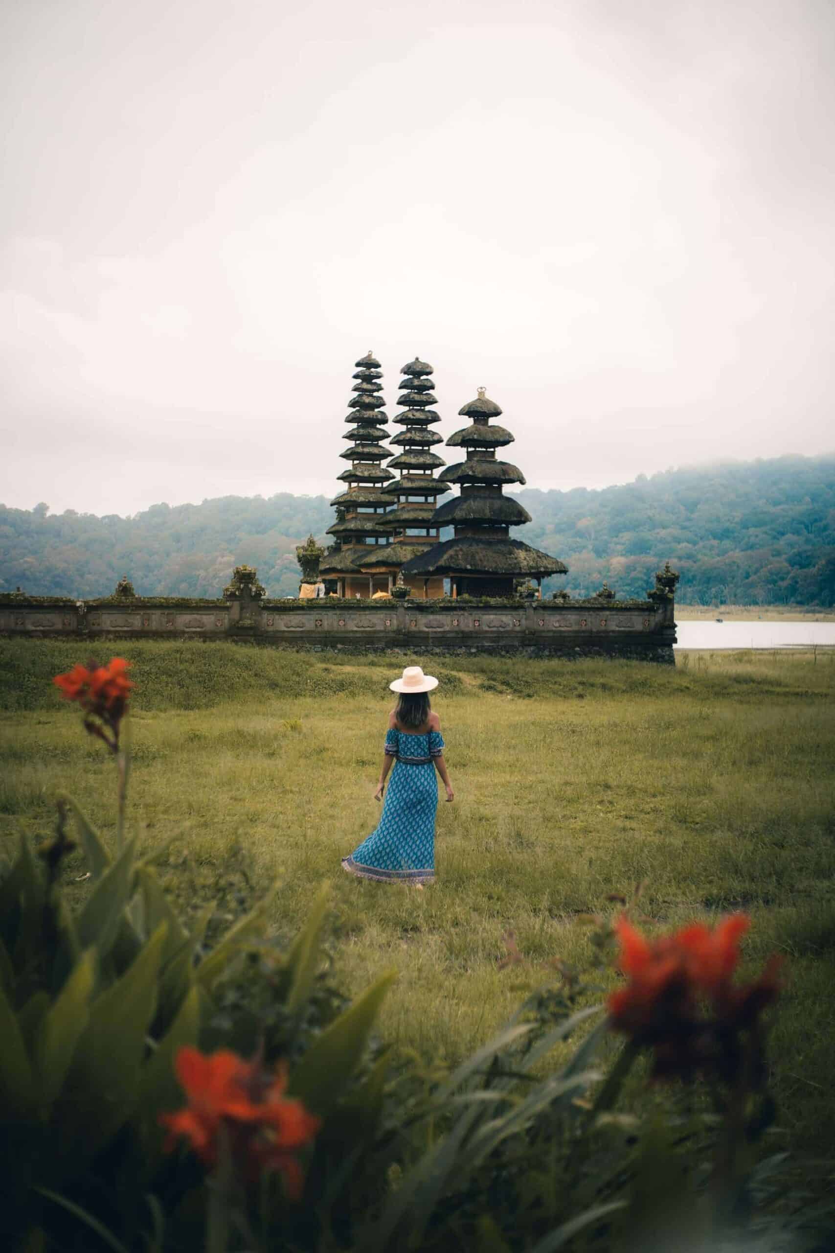 woman standing in a field in Bali Indonesia one of the best Black-friendly countries in Asia