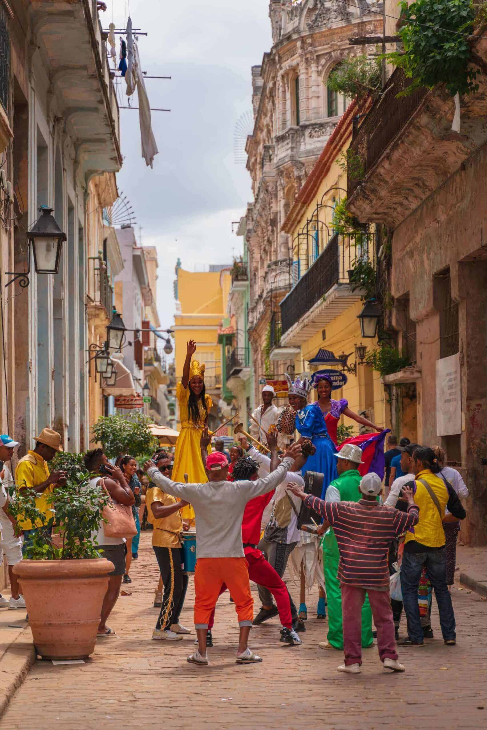 people dancing in the streets oh Havana Cuba best countries for black travelers