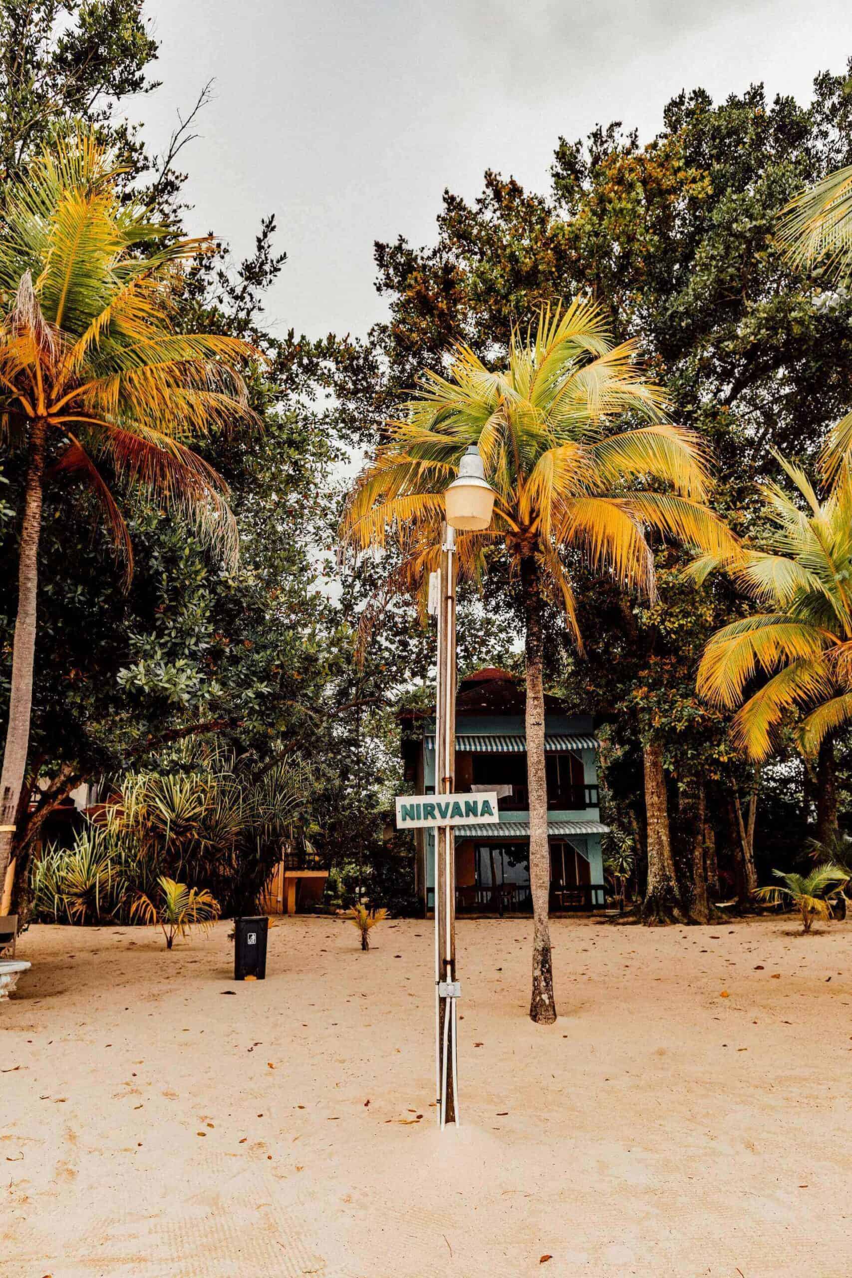 Negril beach Jamiaca scaled empty beach with tree hut in Negril Jamaica with