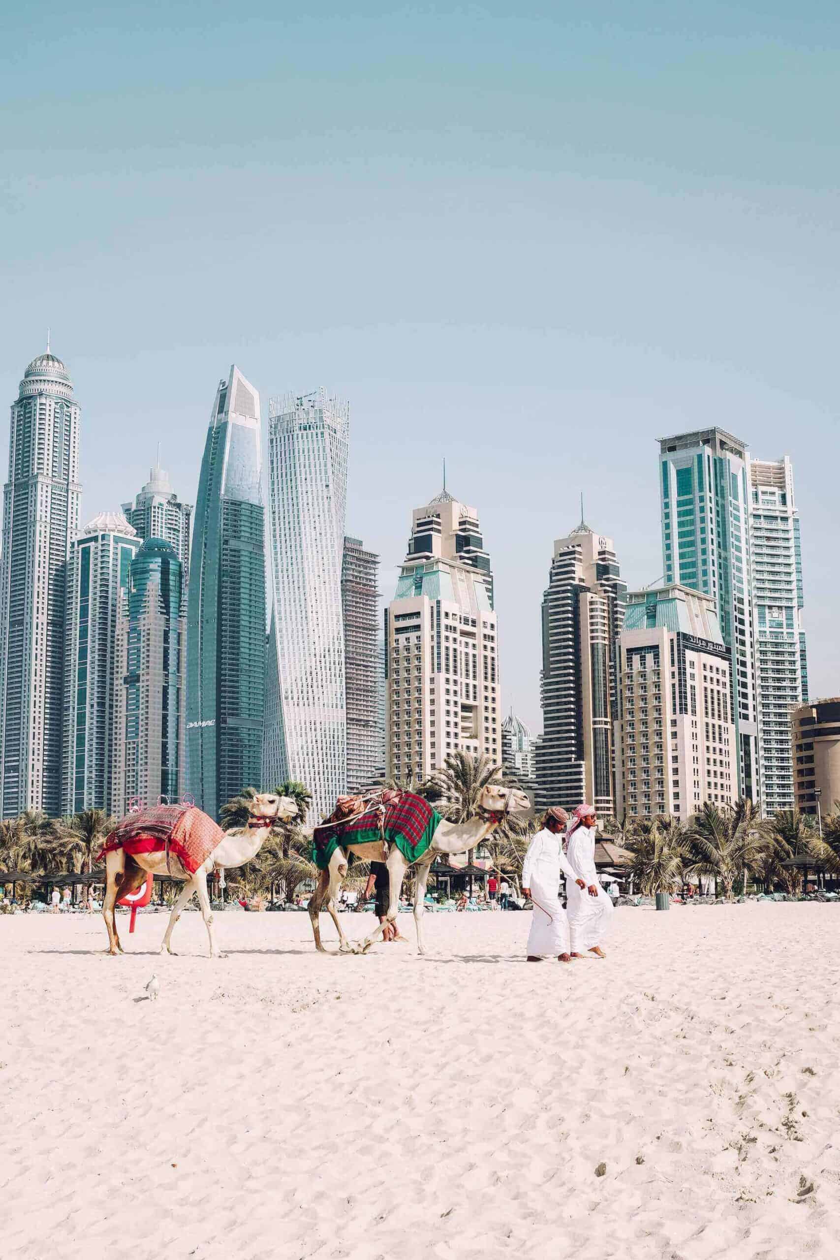 People walking on the beach in United Arab Emirates one of the best countries for black travellers