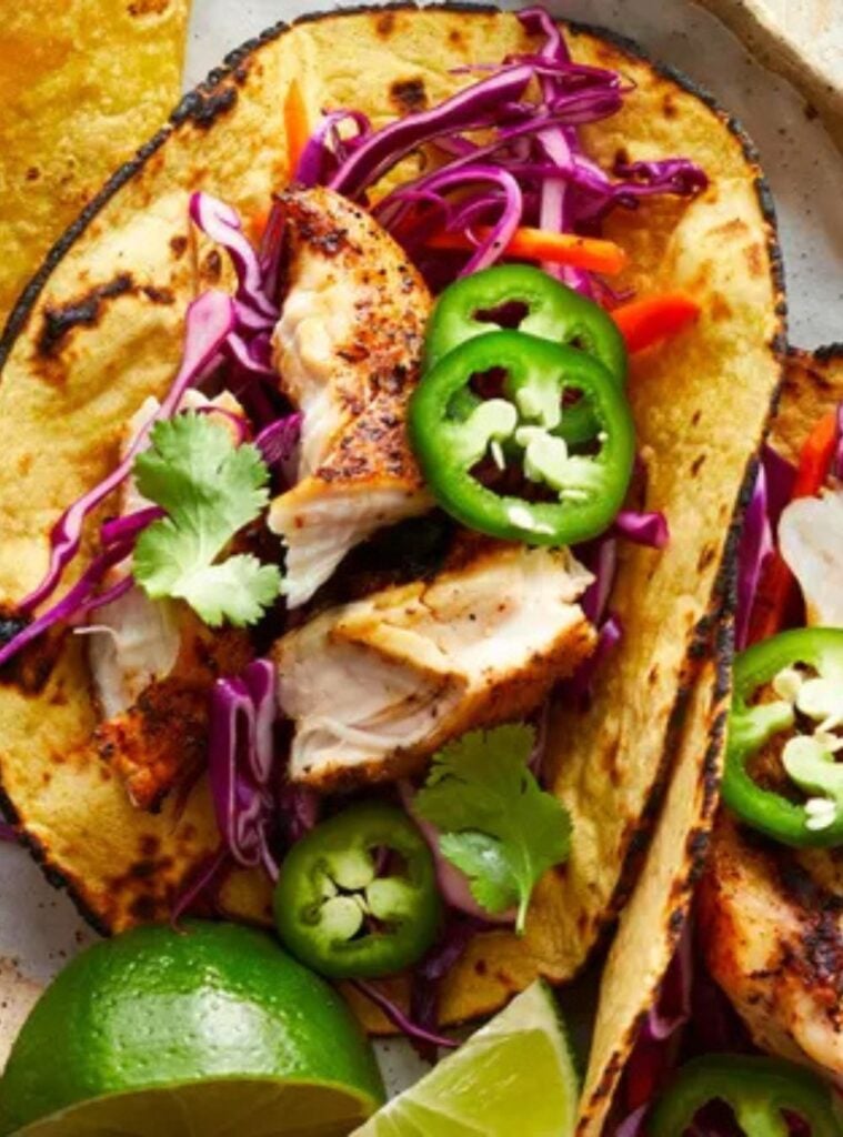 grilled chicken tacos with slaw and lime crema