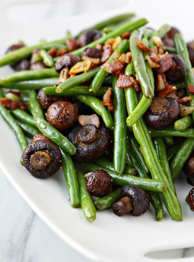 garlic sautéed green beans with bacon and roasted mushrooms