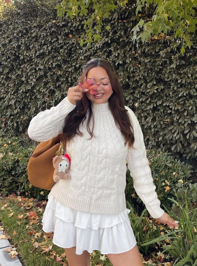 chunky knit sweater + white mini ruffle skirt