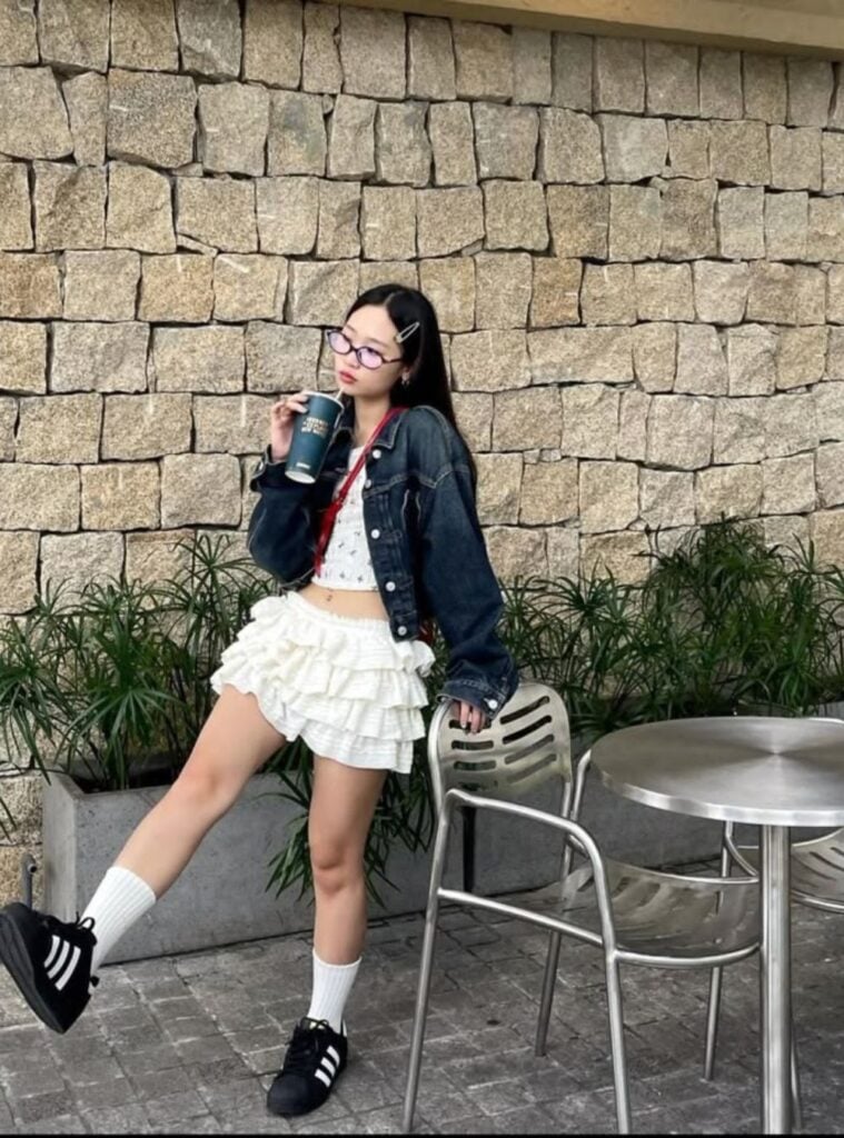 jean jacket + cropped tank + micro ruffle skirt