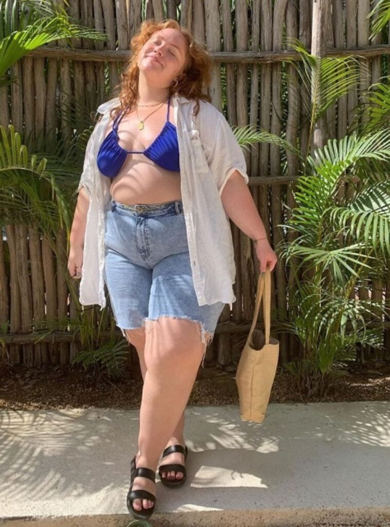 bikini top + oversized shirt + denim shorts + sandals