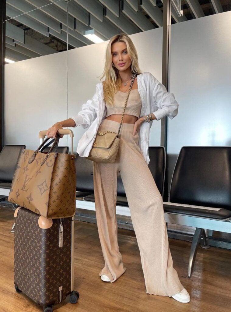 beige co-ord + white shirt + designer luggage