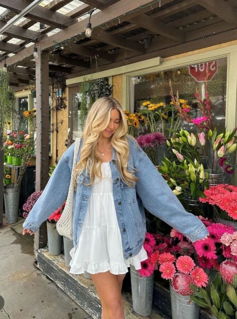 tiered white dress + oversized jacket + net tote