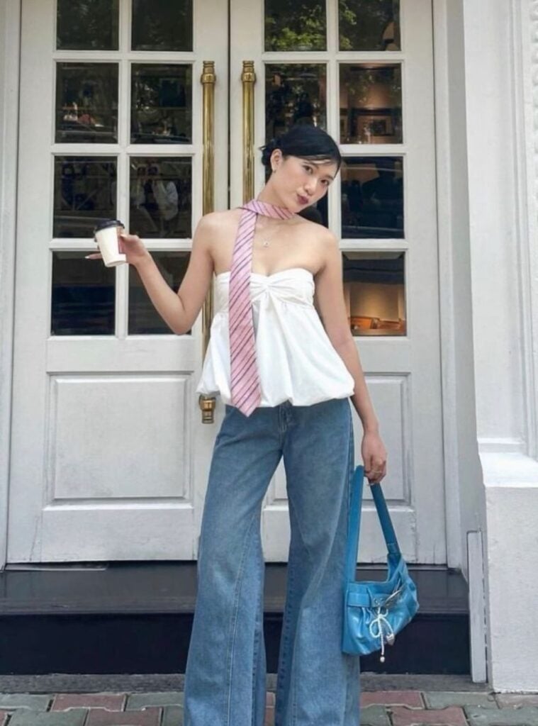 strapless top + flared jeans + pink tie