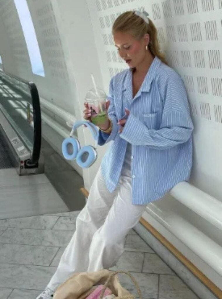 striped oversized shirt + white pants + chunky headphones