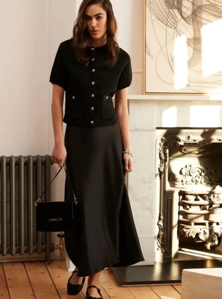 buttoned black top + long black skirt + ballet flats