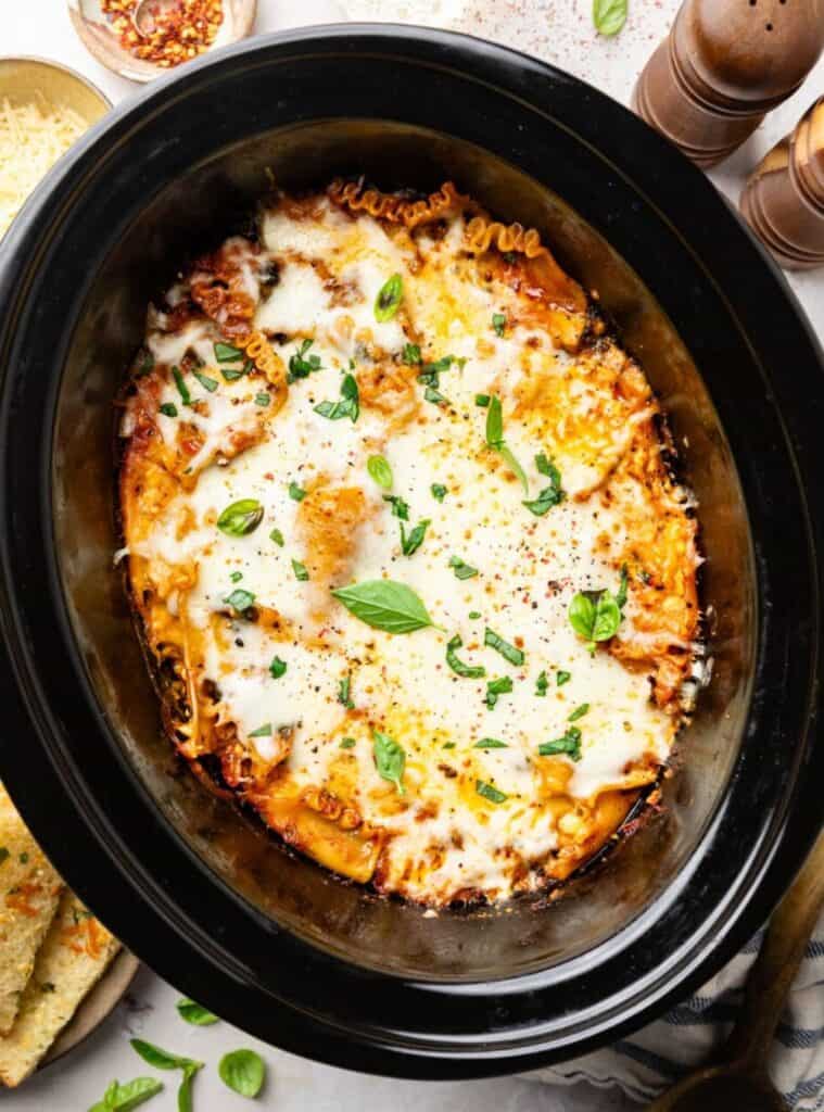 Layered crockpot lasagna with noodles, sauce, and cheese for easy family-friendly dinners.
