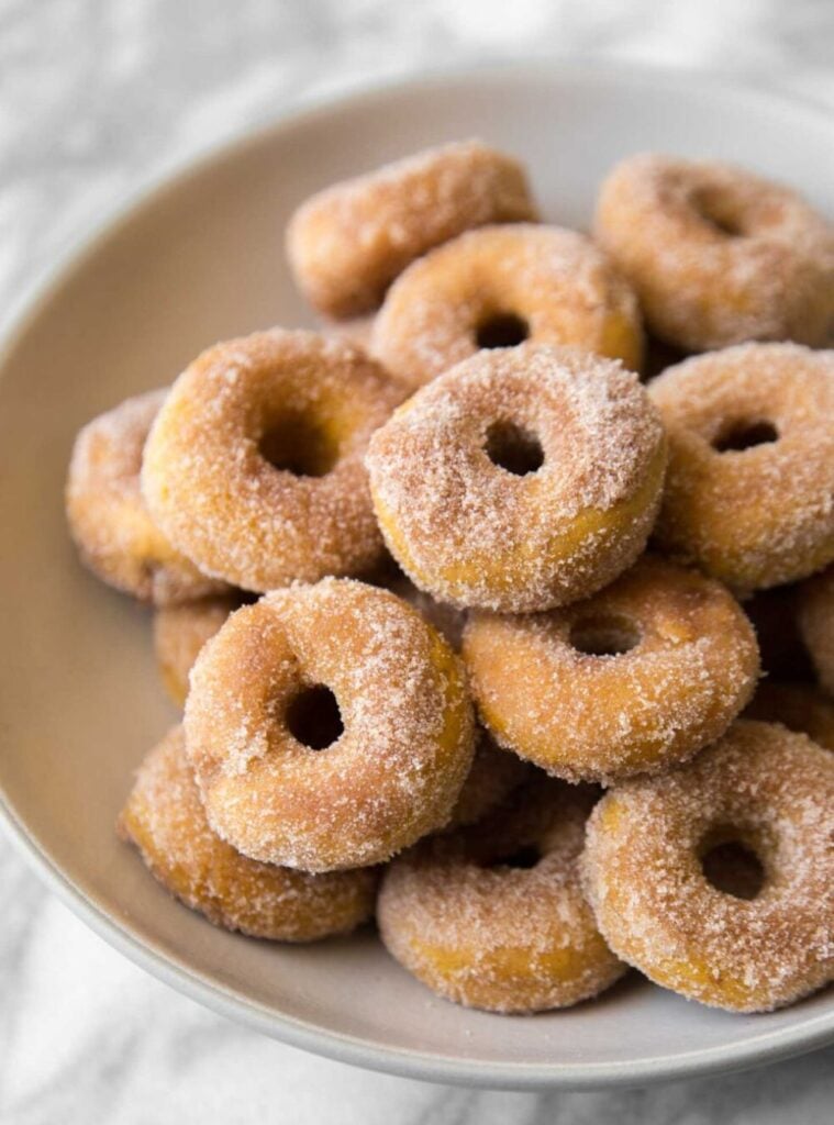 baked pumpkin donuts with cinnamon sugar topping, a lighter healthy fall breakfast choice