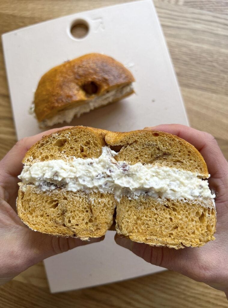 pumpkin sourdough bagels sliced and spread with cream cheese, hearty healthy fall breakfast
