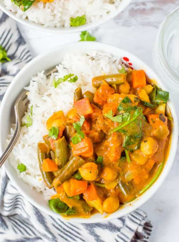 chickpea and vegetable curry simmering in slow cooker, fall crockpot meal idea