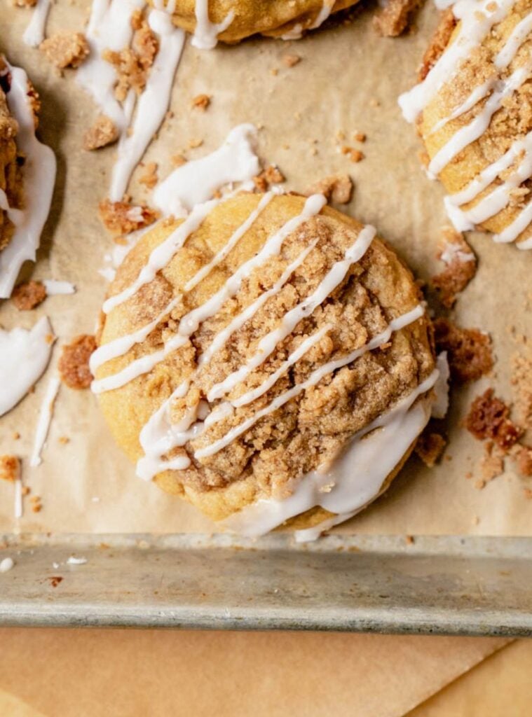 pumpkin cookies with cinnamon streusel crumb topping on a plate