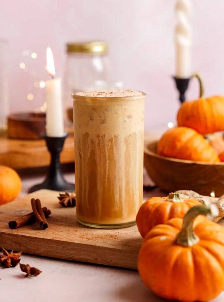 warm mug of pumpkin spice chai latte topped with foam, cozy easy pumpkin recipe