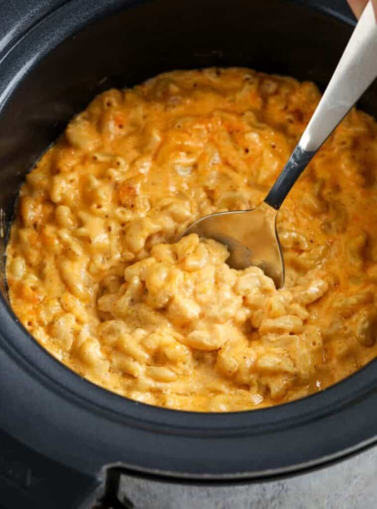 creamy mac and cheese in crockpot, comforting fall crockpot dish for parties