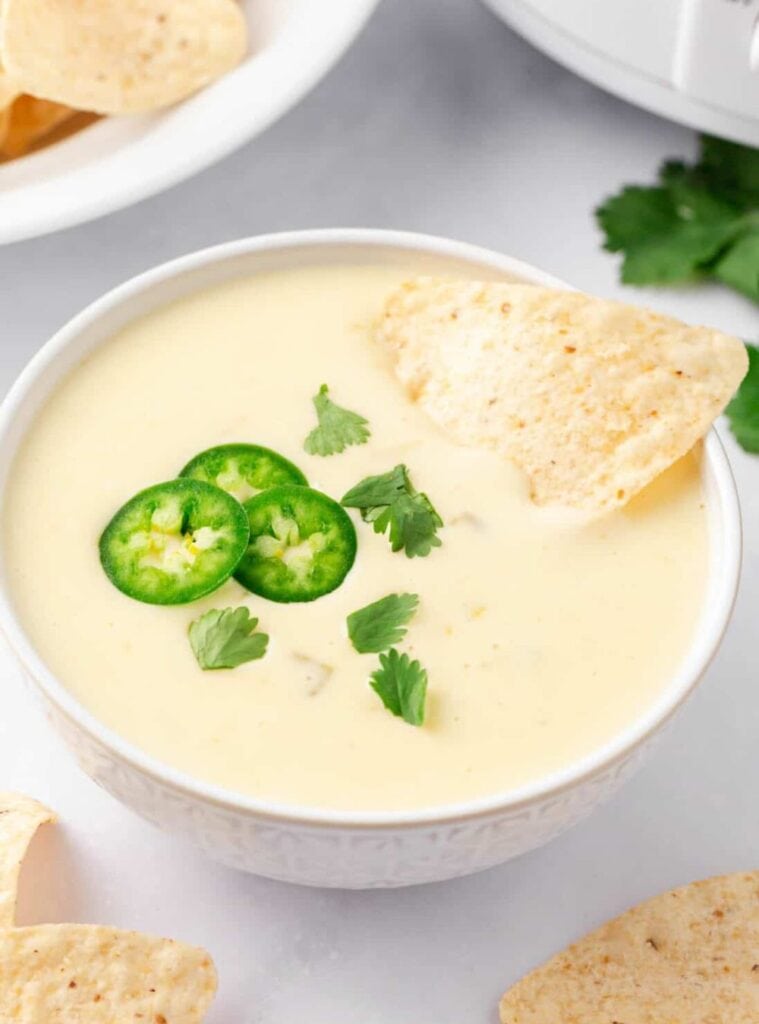 queso blanco dip in crockpot, cheesy fall slow cooker party recipe