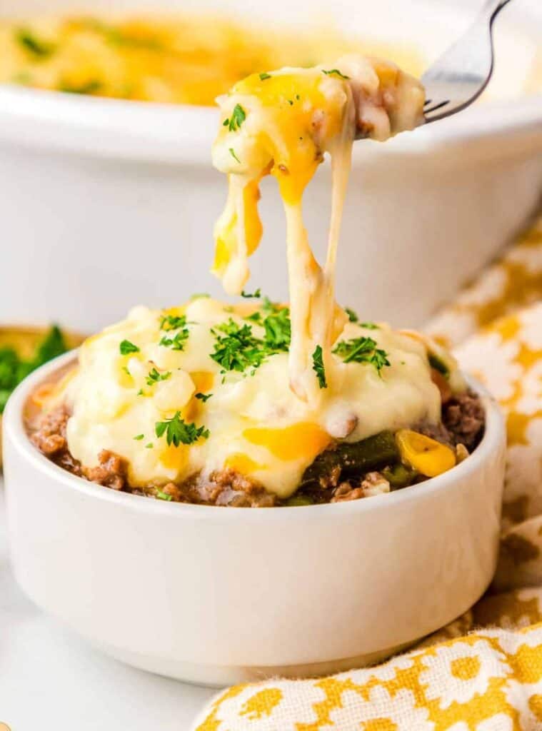 shepherd’s pie with beef, veggies, and mashed potatoes in crockpot, comforting fall slow cooker recipe