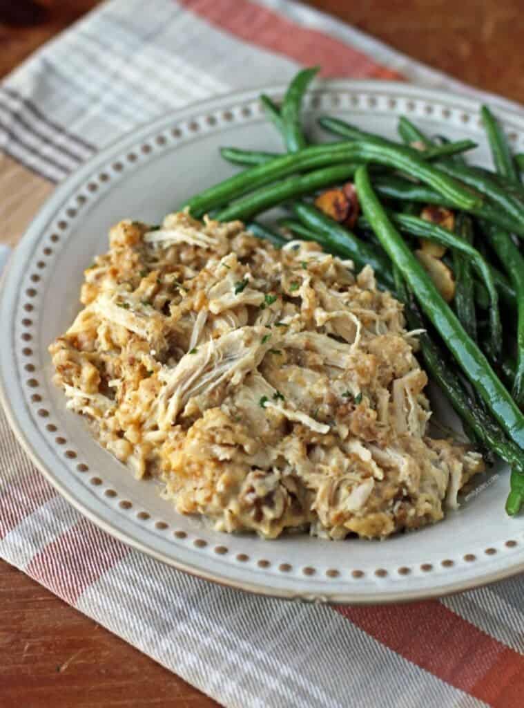 chicken and stuffing cooked in a slow cooker, comforting fall crockpot dinner