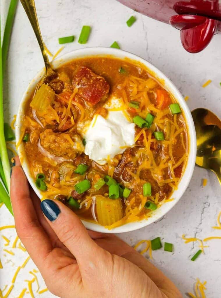 turkey chili with pumpkin and beans made in a crockpot, healthy fall slow cooker recipe