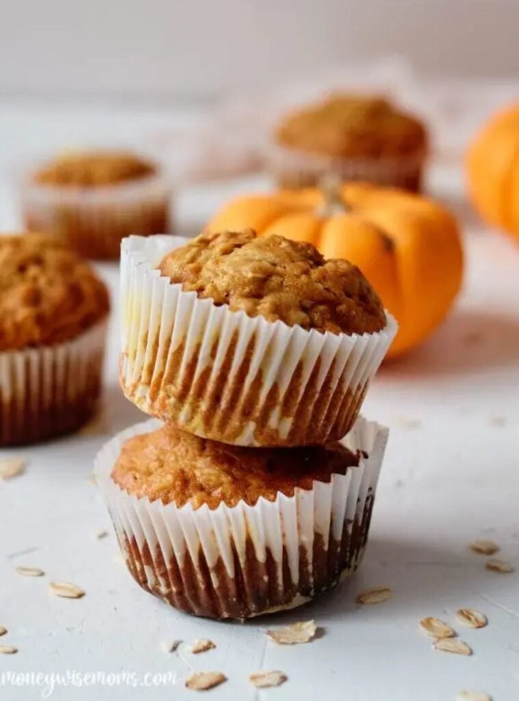 batch of pumpkin oatmeal muffins in a basket, simple healthy fall breakfast idea