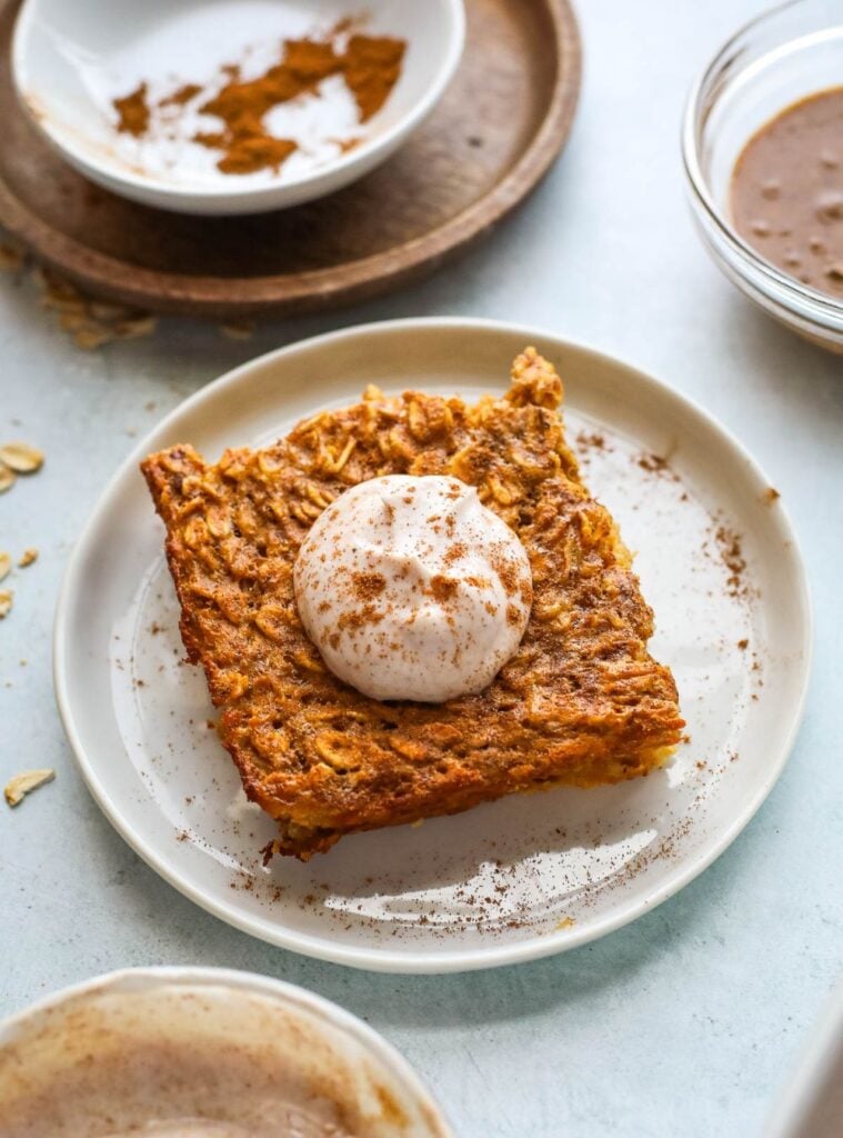 baked pumpkin oatmeal in a casserole dish, cozy and filling, one of the best healthy pumpkin recipes