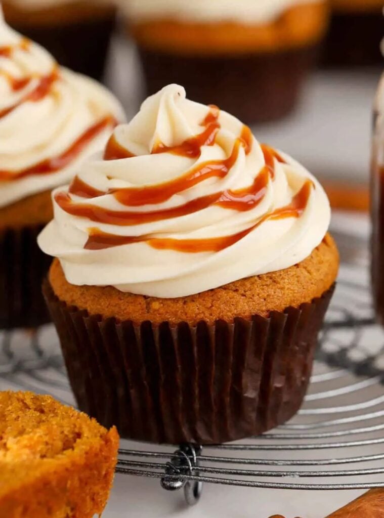 fluffy cupcakes topped with maple glaze, fun pumpkin treats