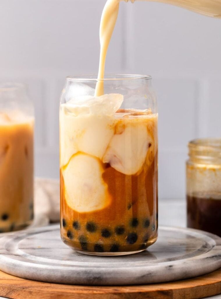 bubble tea with pumpkin spice and tapioca pearls, playful fall beverage