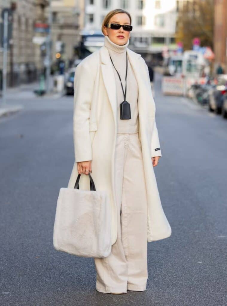 1 Cream Wool Coat Ribbed Turtleneck and Wide Leg Corduroy Pants white christmas outfit ideas for women cream coat corduroy pants