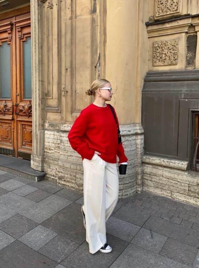 12 Red Crewneck Sweater Cream Wide Leg Trousers Sneakers Red Top Handle Bag red and white outfit ideas red sweater cream trousers sneakers