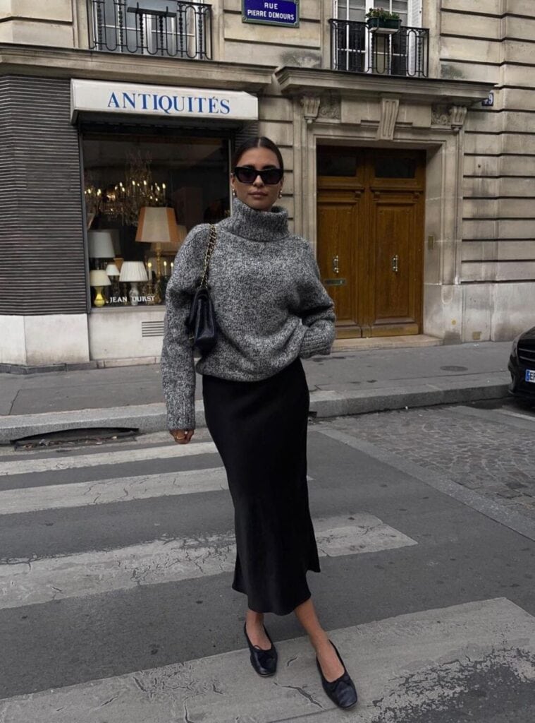 14 Grey Turtleneck Sweater Black Silk Midi Skirt Black Pointed Flats Black Chain Shoulder Bag christmas eve outfit ideas grey sweater silk skirt