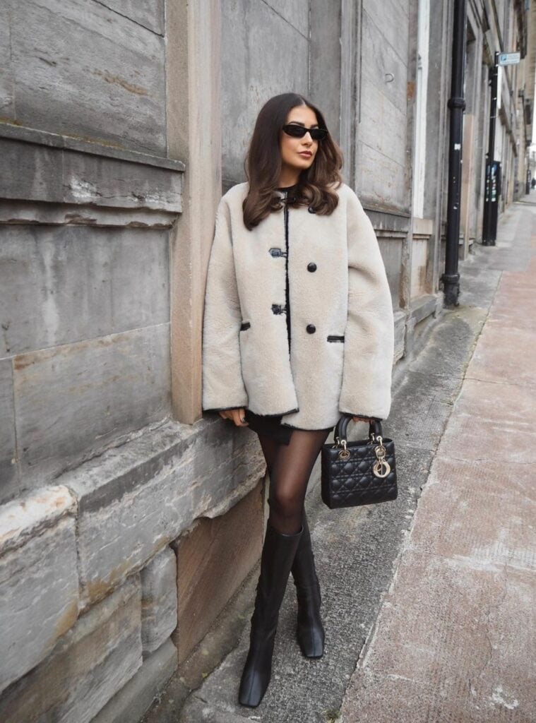 22 Fluffy Cardigan Corset Top Mini Skirt and Cream Boots christmas inspo outfit fluffy cardigan mini skirt