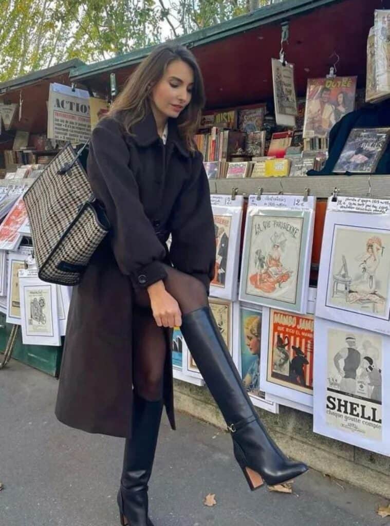 23 Brown Maxi Coat Black Mini Dress Brown Tights Black Knee High Boots Houndstooth Tote Bag office christmas party outfit for women brown coat mini dress