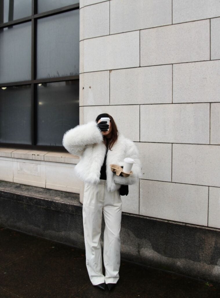 23 Cropped White Fur Coat Tailored Trousers and Black Heels white christmas outfit cropped fur coat trousers